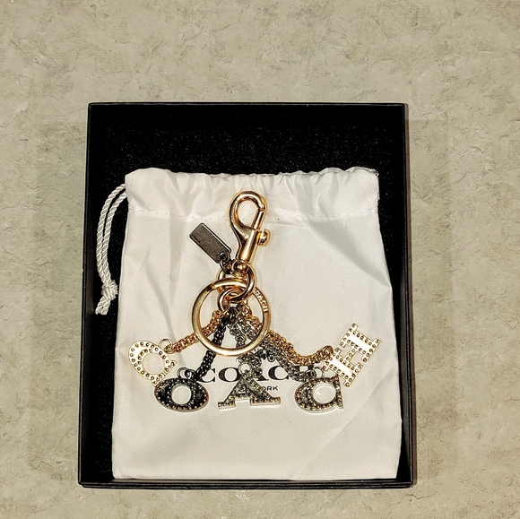NWOT Coach Perforated Sparkle "COACH" Letters Gun Metal Bag Charm Keychain - Picture 6 of 7